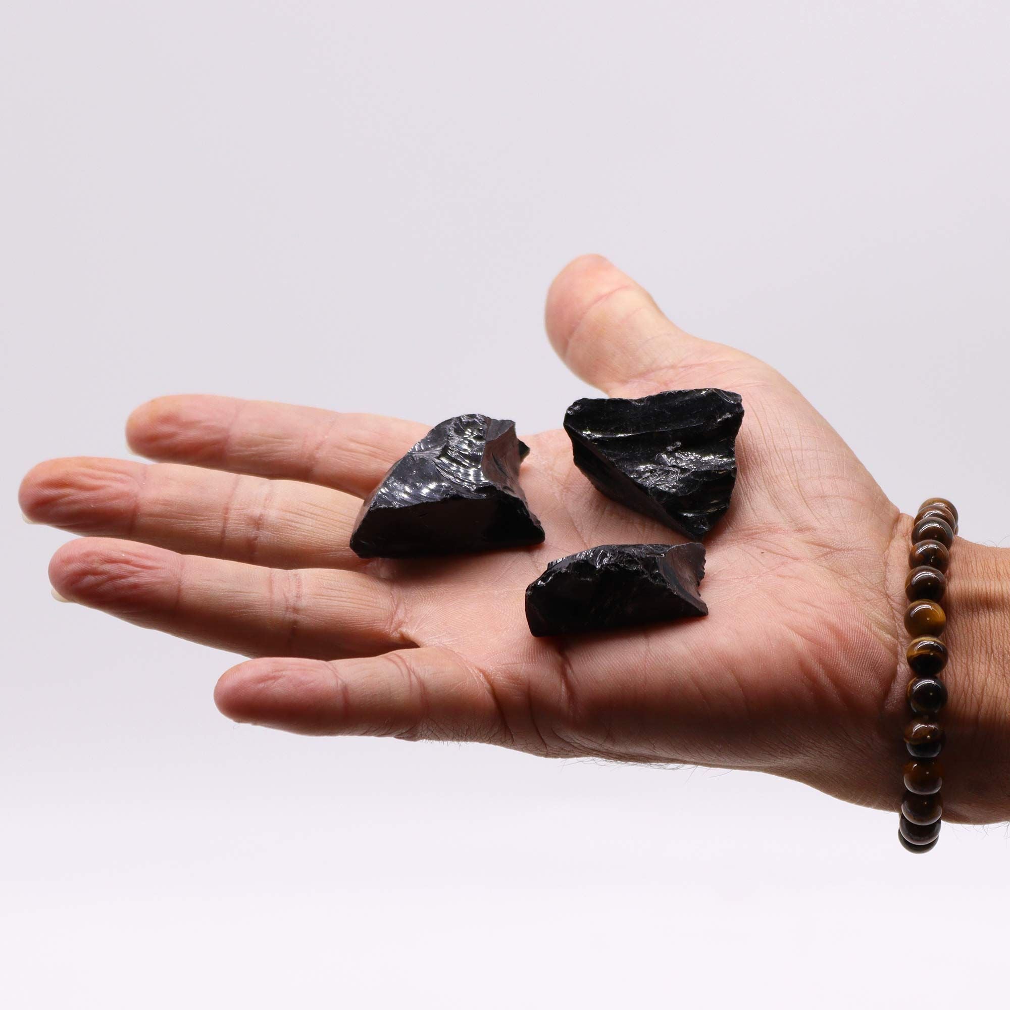 Cristalli Grezzi di Ossidiana Nera – Potere di Protezione Assoluta 🌑