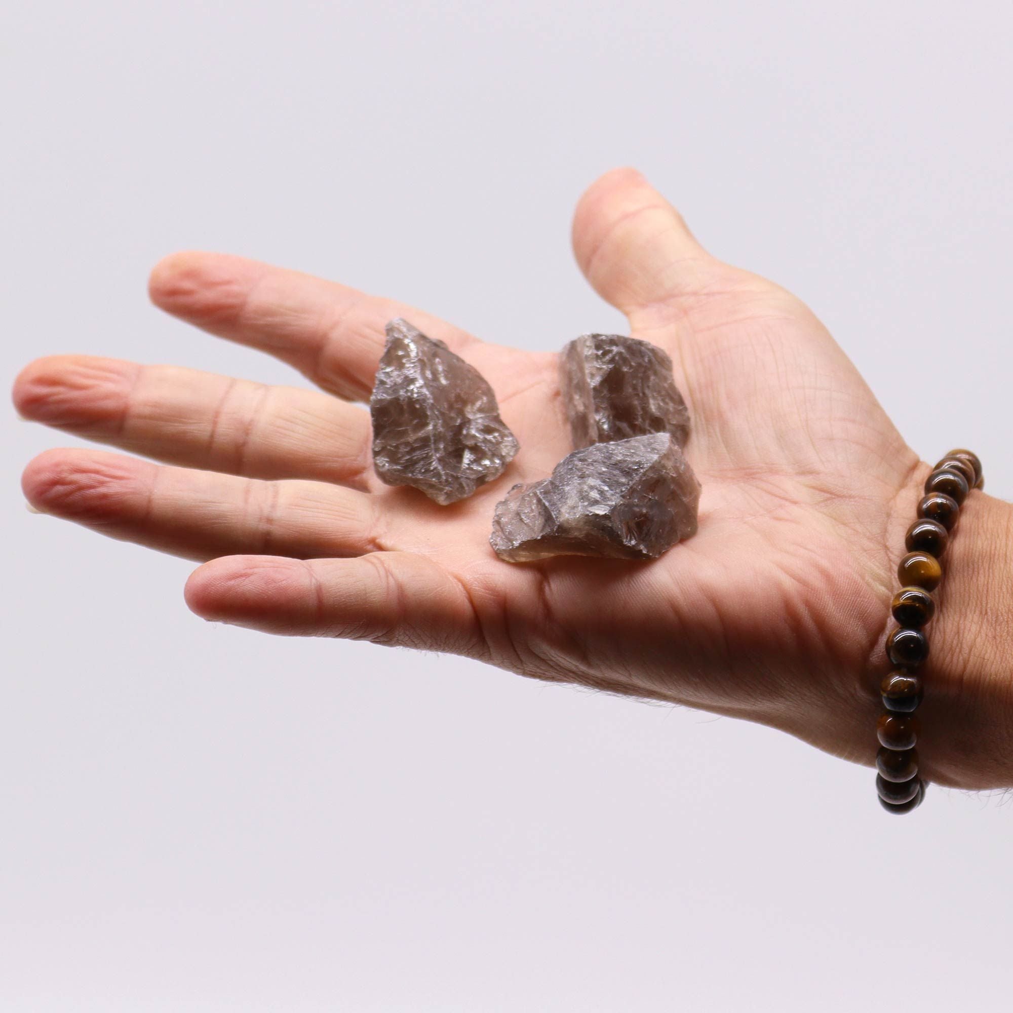 Cristalli Grezzi di Quarzo Fumè – Abbraccia la Tranquillità Divina 🌌